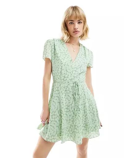 Glamorous  - Robe rétro courte à manches courtes et petites fleurs avec col V et taille nouée - Vert 