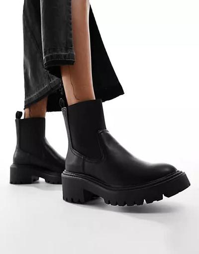 Stradivarius  - Bottines chunky style motard avec semelle striée - Noir 